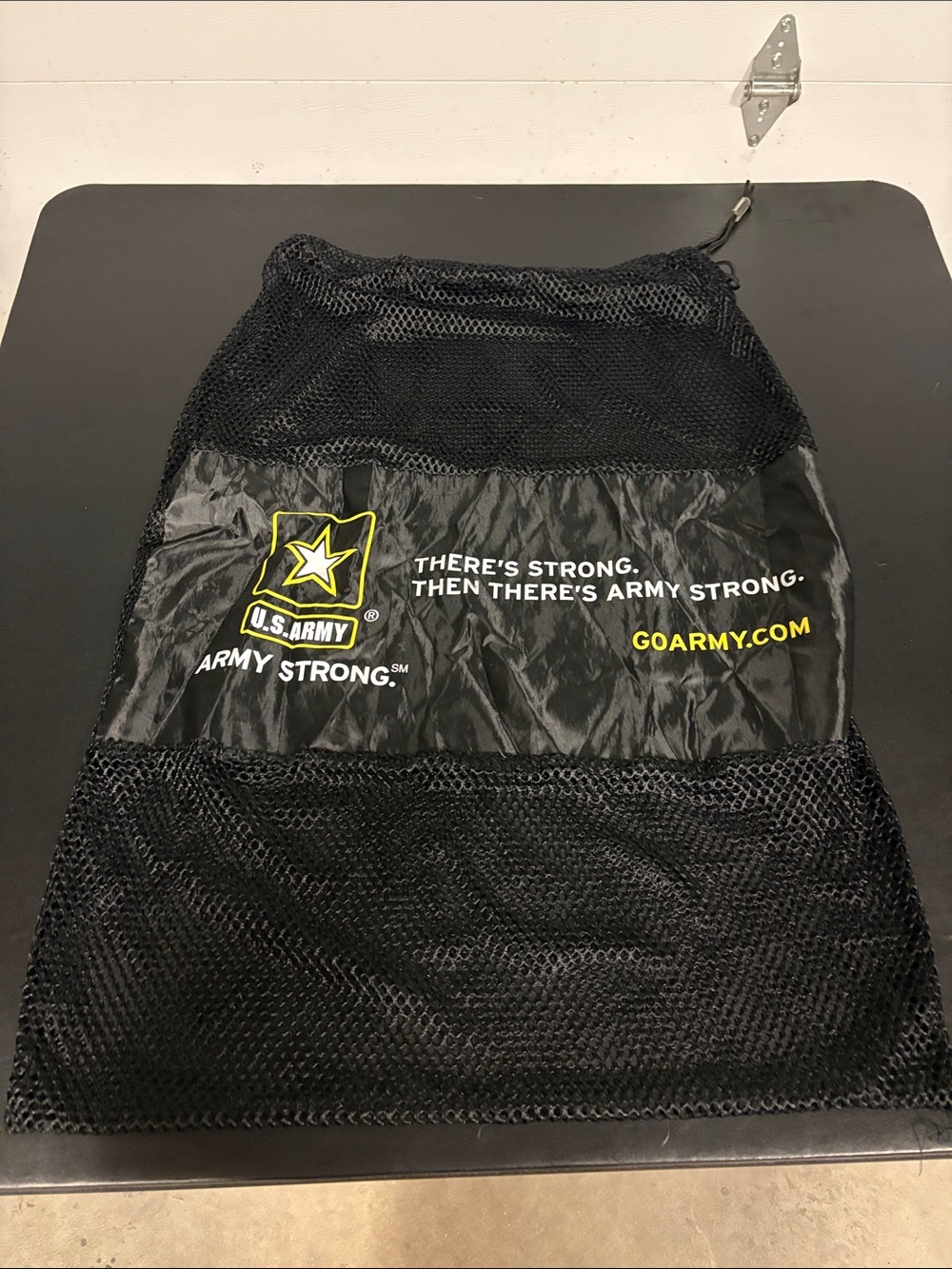 U.S. Army Black Mesh Drawstring Duffel Bag with Yellow Logo